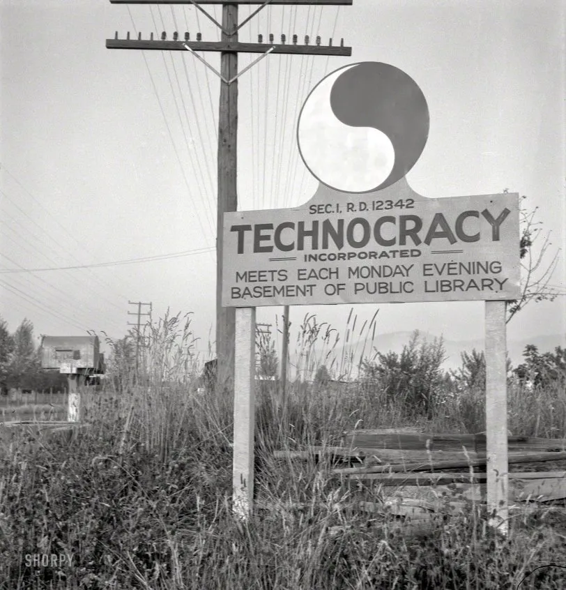 A sign for Technocracy Incorporated in a field